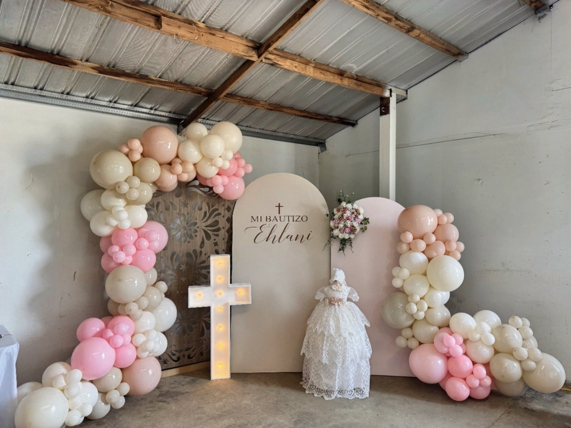 Blush balloon arch installation by Luxe Balloon Co.